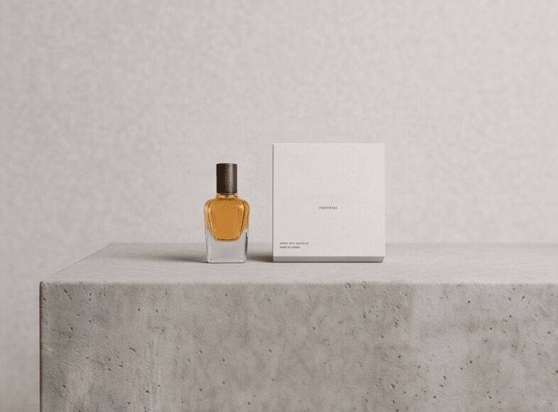Elmiral bottle and box resting on a concrete ledge